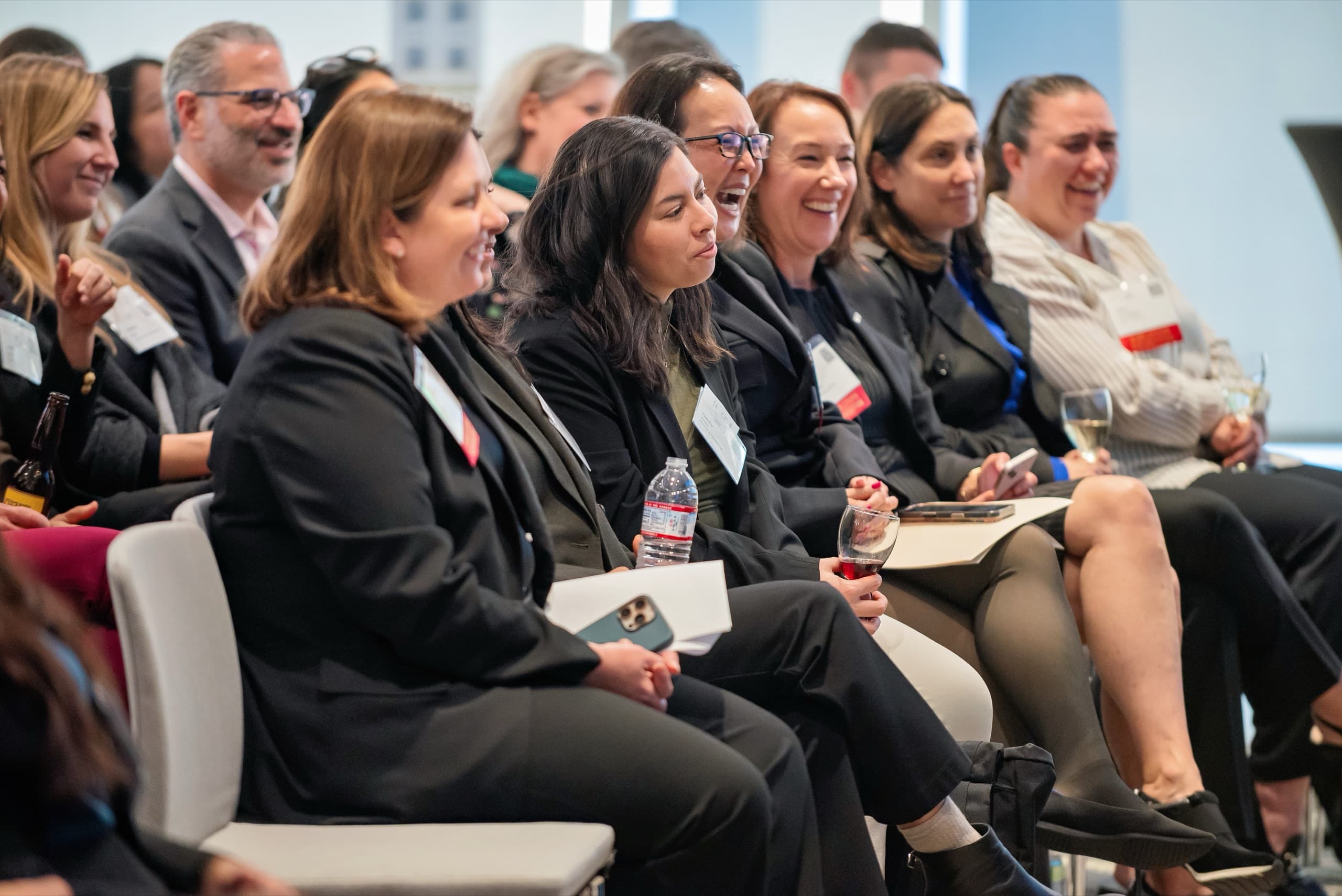 Engaged audience at a conference reception in San Francisco — professional conference photography