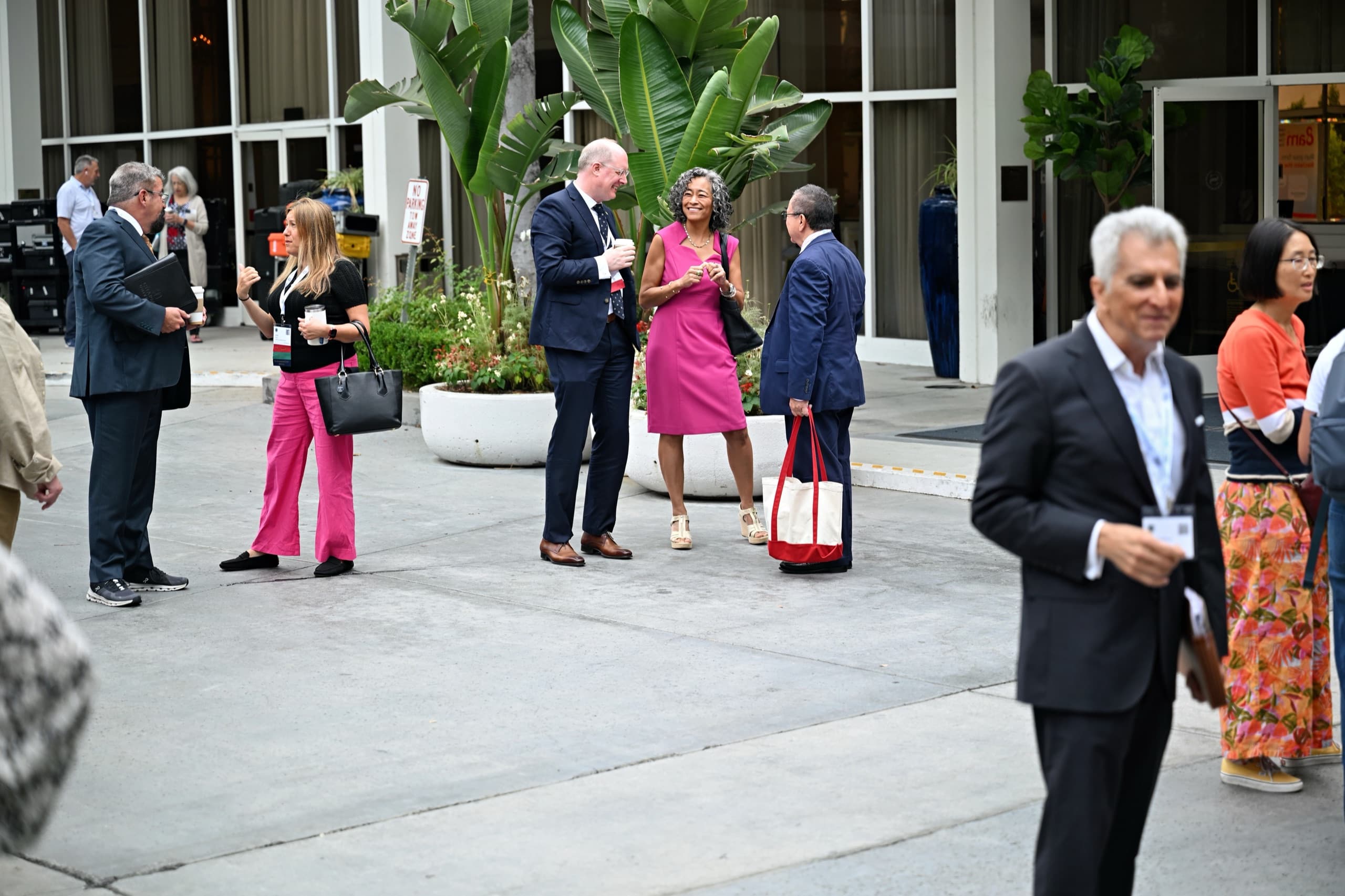 Attendees networking outside a professional conference — Rojas Photography