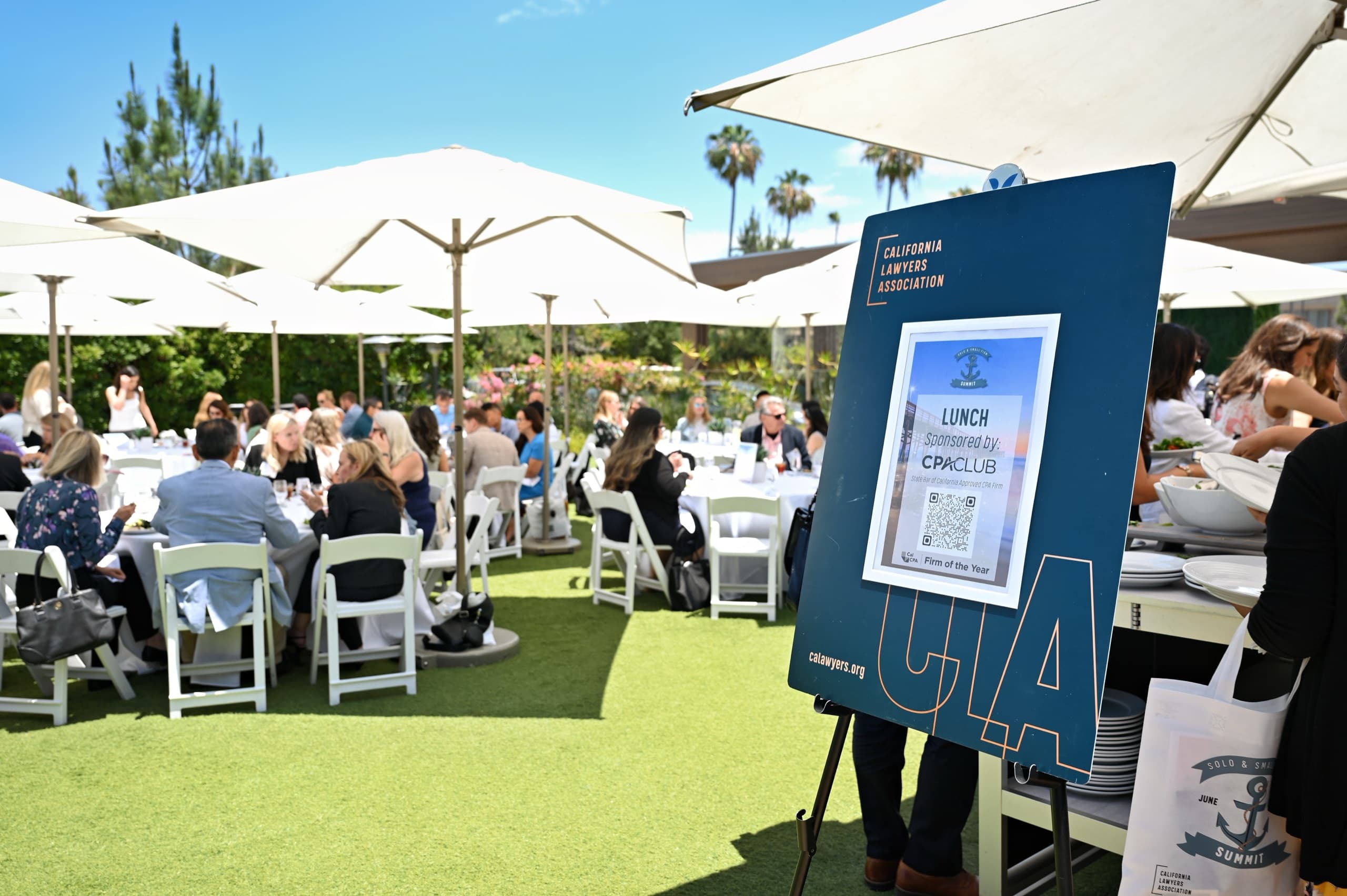 Branded outdoor networking lunch at the CLA Solo & Small Firm Summit — conference photography