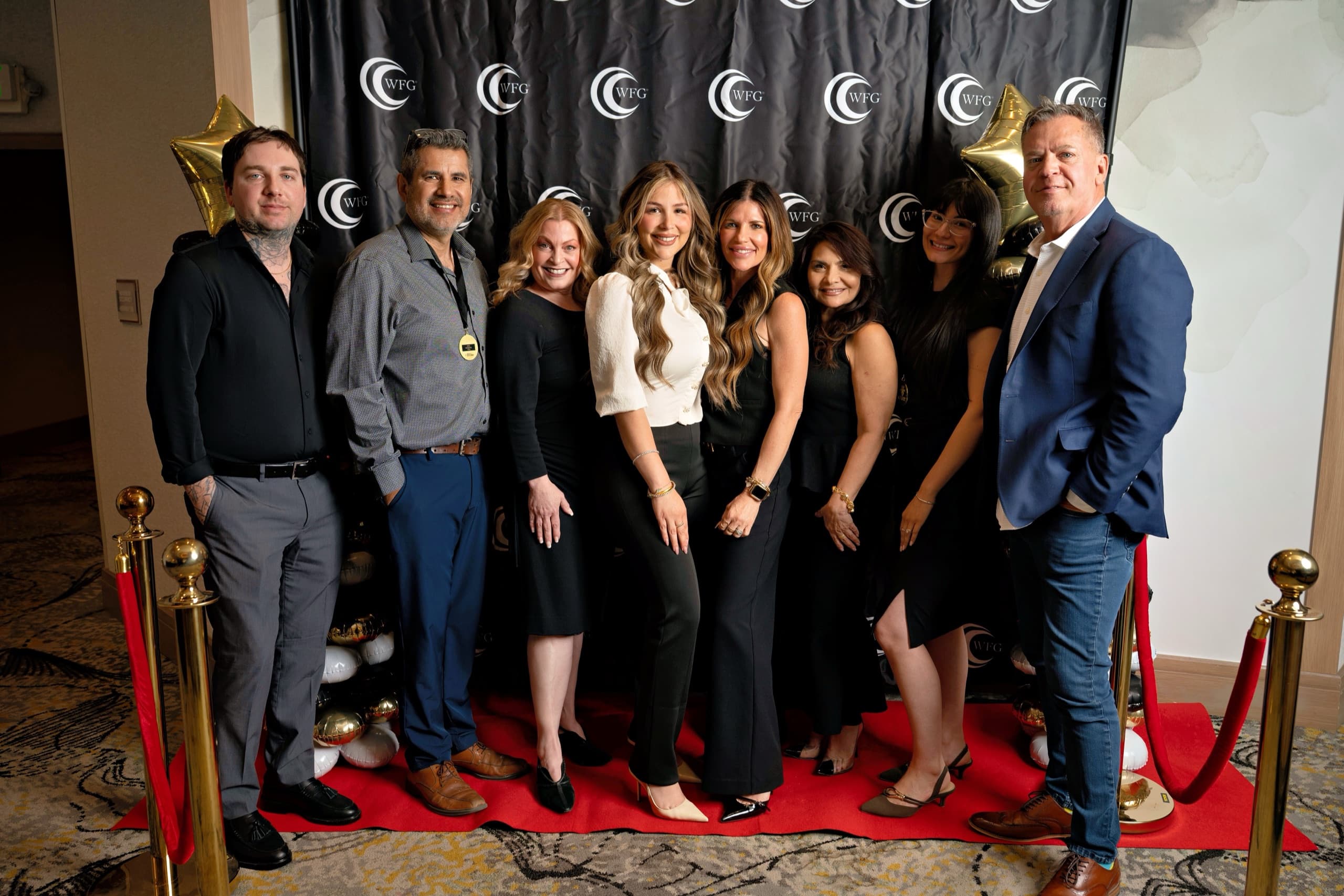 Team on the red carpet at a corporate awards gala in Modesto — event photography